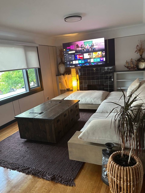 Coffee table and sofa by the front window