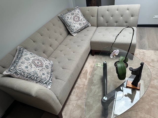 Sofa and glass coffee table