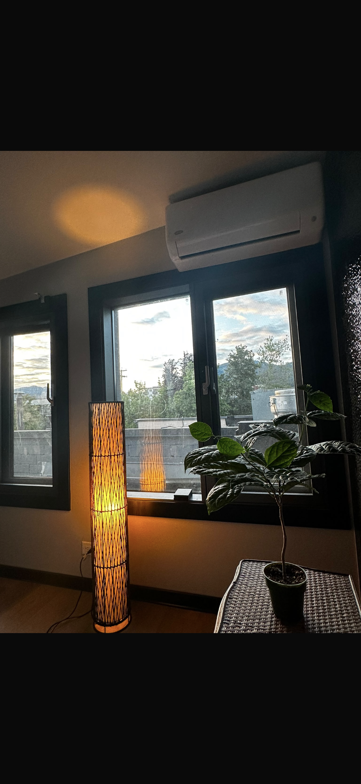Lounge area with heat pump and city view
